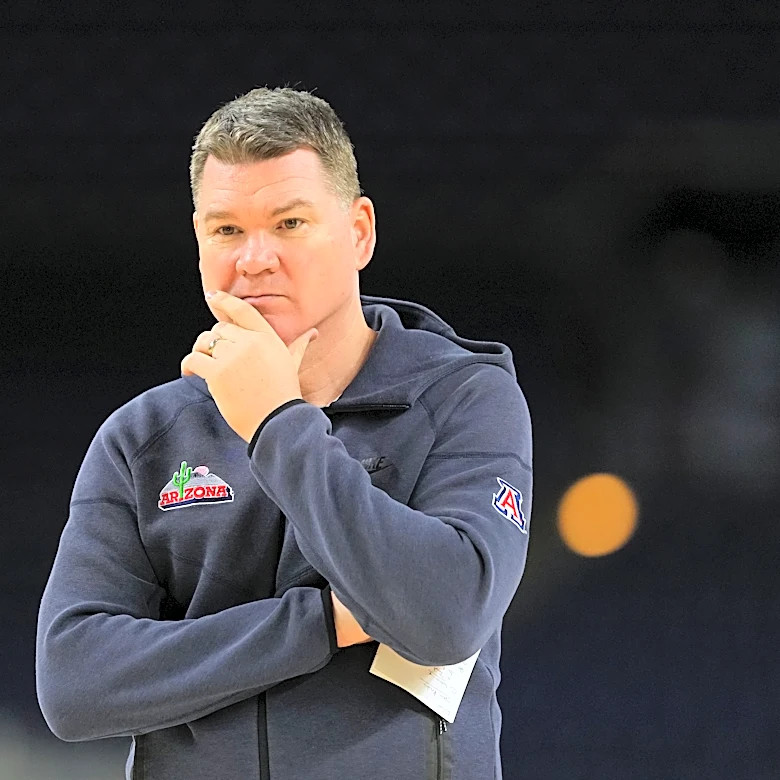 Arizona coach stays and Michigan awaits the Wildcats for heavyweight game at a distracted Final Four