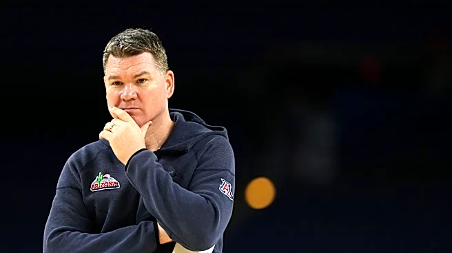 Arizona coach stays and Michigan awaits the Wildcats for heavyweight game at a distracted Final Four