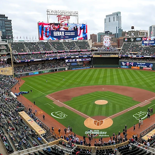 Twins endure a pregame power outage on a cold, rainy day to make for a happy home opener