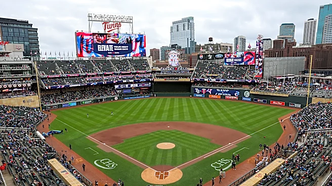 Twins endure a pregame power outage on a cold, rainy day to make for a happy home opener