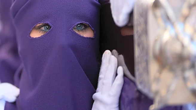 Women take pride in Holy Week roles after a Spanish Catholic brotherhood's procession excluded them