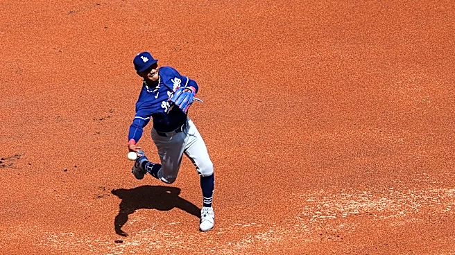 Mookie Betts leaves the game in the 1st inning for the Dodgers with right lower back pain