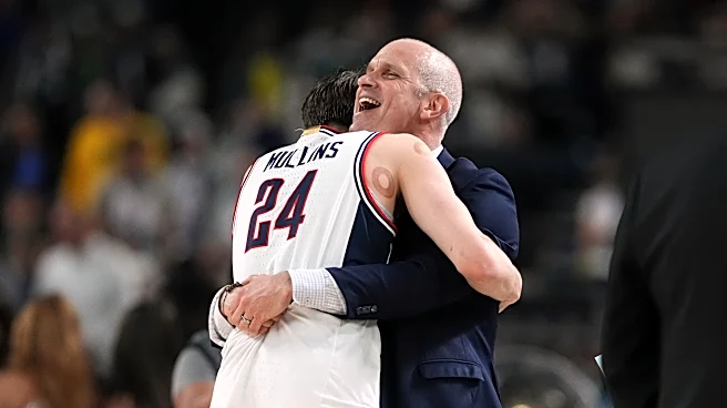 UConn reaches 3rd national title game in 4 seasons, beating Illinois 71-62 behind Mullins and Reed