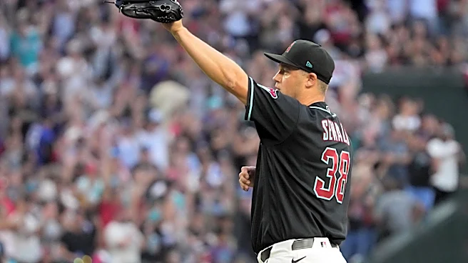 Diamondbacks score twice on bunt and throwing error, hold off Braves 2-1