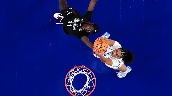 Staley embraces UCLA's Close ahead of title game, then smirks to the crowd after handshake drama