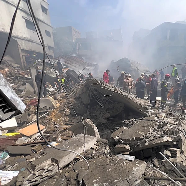 Airstrike hits building near Iran's capital as Trump makes threat over strait closure