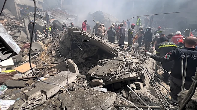 Airstrike hits building near Iran's capital as Trump makes threat over strait closure