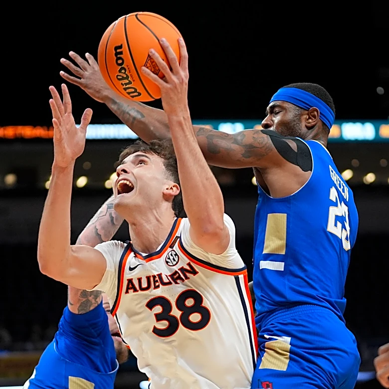 Overton, Pettiford help Auburn beat Tulsa 92-86 in OT for 1st NIT championship