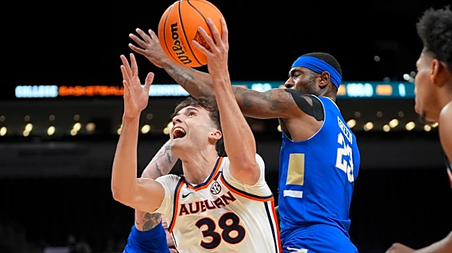 Overton, Pettiford help Auburn beat Tulsa 92-86 in OT for 1st NIT championship