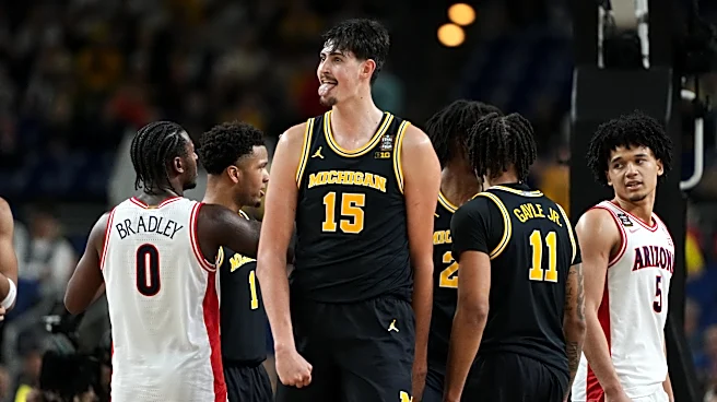 In NCAA title game, a Michigan team on a roll tries to derail a UConn dynasty