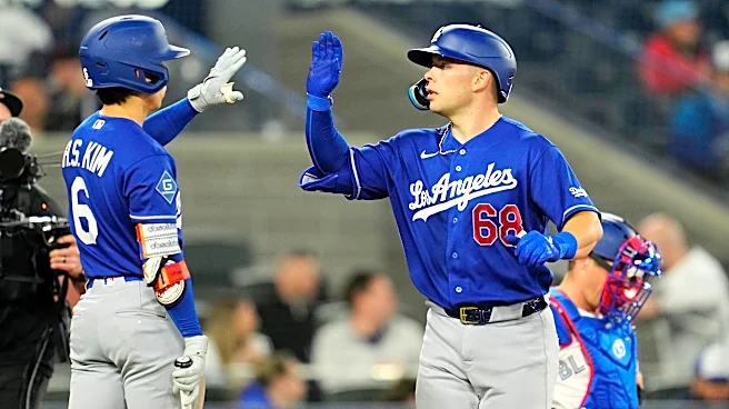 Rushing homers twice, Ohtani goes deep as Dodgers rout Blue Jays 14-2 in World Series rematch