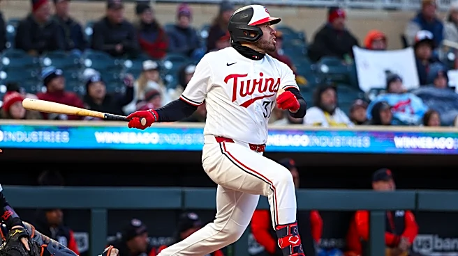 Keaschall hits a 2-run homer and the Twins hold on for a frigid 7-3 win over the Tigers