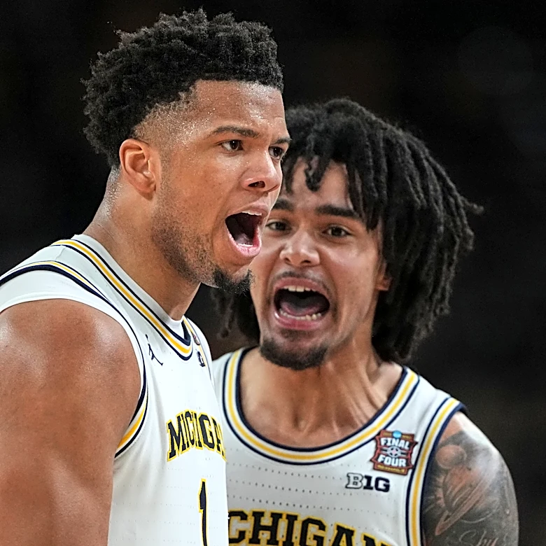 Michigan powers to its second national title and first since 1989, beating UConn 69-63