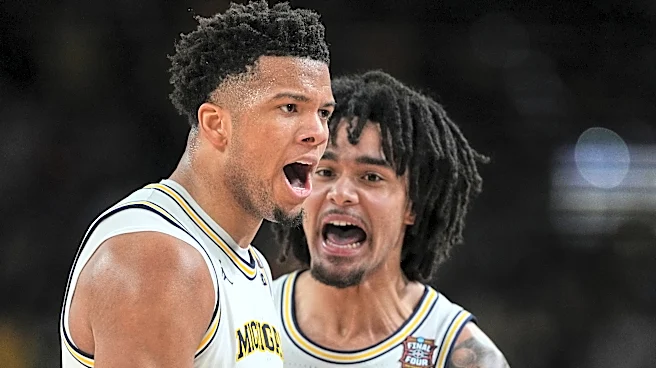 Michigan powers to its second national title and first since 1989, beating UConn 69-63