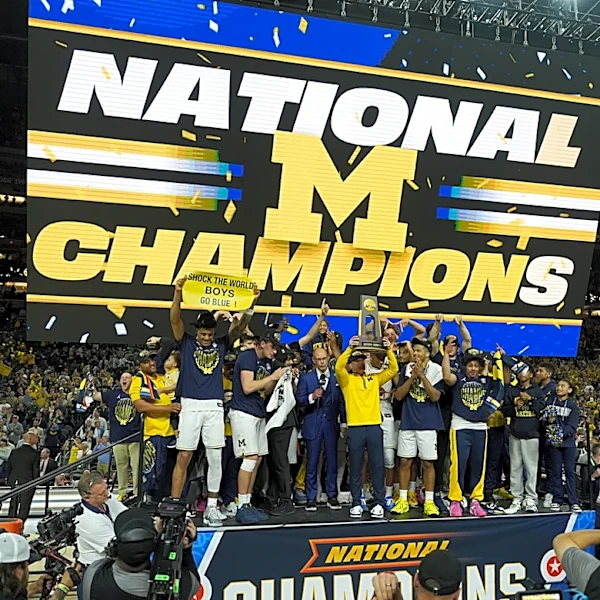Michigan muscles its way to program's 2nd national title, beating stubborn UConn 69-63