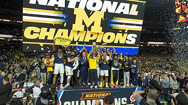 Michigan muscles its way to program's 2nd national title, beating stubborn UConn 69-63