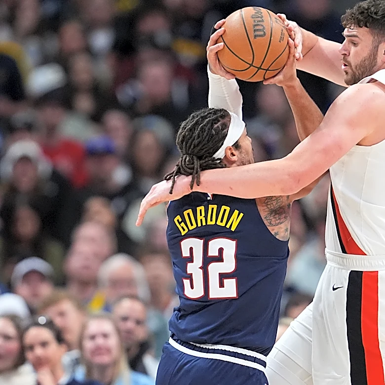 Jokic's 35 points, 13 rebounds, 13 assists help the Nuggets get past the Trail Blazers 137-132 in OT
