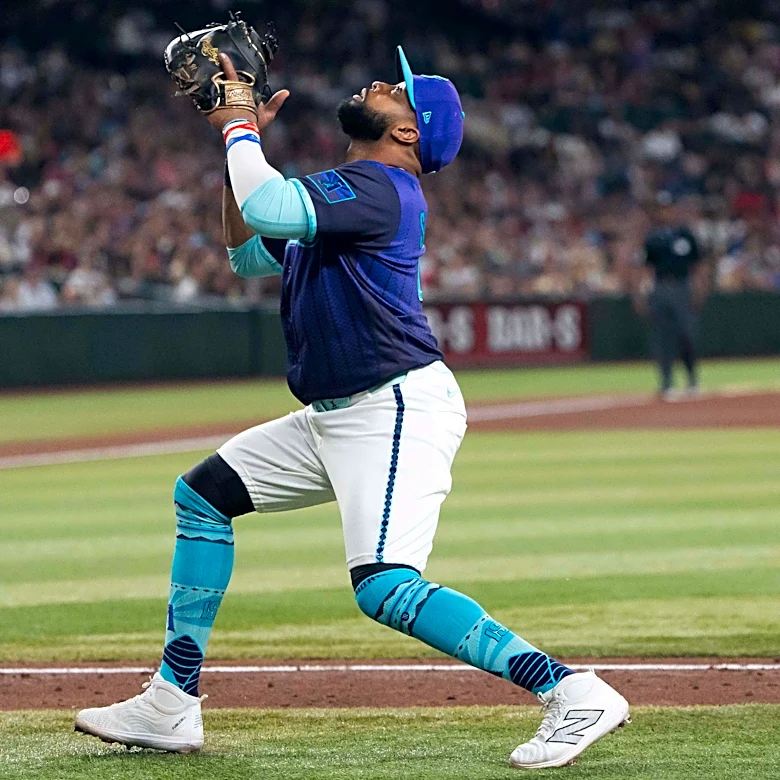 Diamondbacks put Carlos Santana on injured list with adductor strain, select Luken Baker