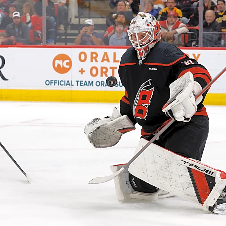 Hurricanes overcome Geekie's hat trick, top Bruins in OT to claim the Metropolitan Division title