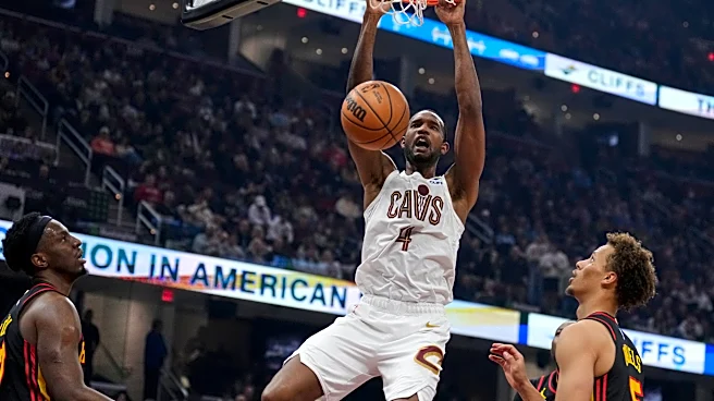 Donovan Mitchell and Evan Mobley help Cavaliers hold off Hawks 122-116