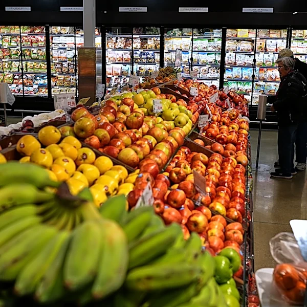 US economy grew a sluggish 0.5% in fourth quarter, government says, downgrading previous estimate