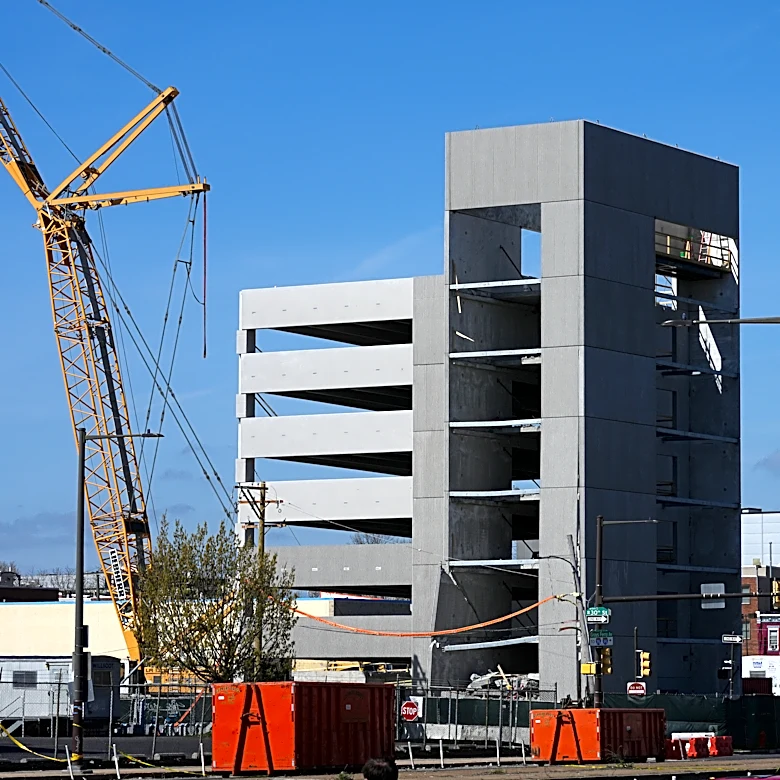 1 killed and 2 missing after partial roof collapse at parking garage being built in Philadelphia