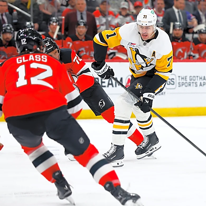 Malkin, Crosby and Letang help the Penguins beat the Devils to clinch a playoff spot