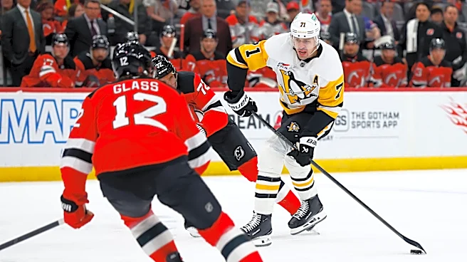Malkin, Crosby and Letang help the Penguins beat the Devils to clinch a playoff spot
