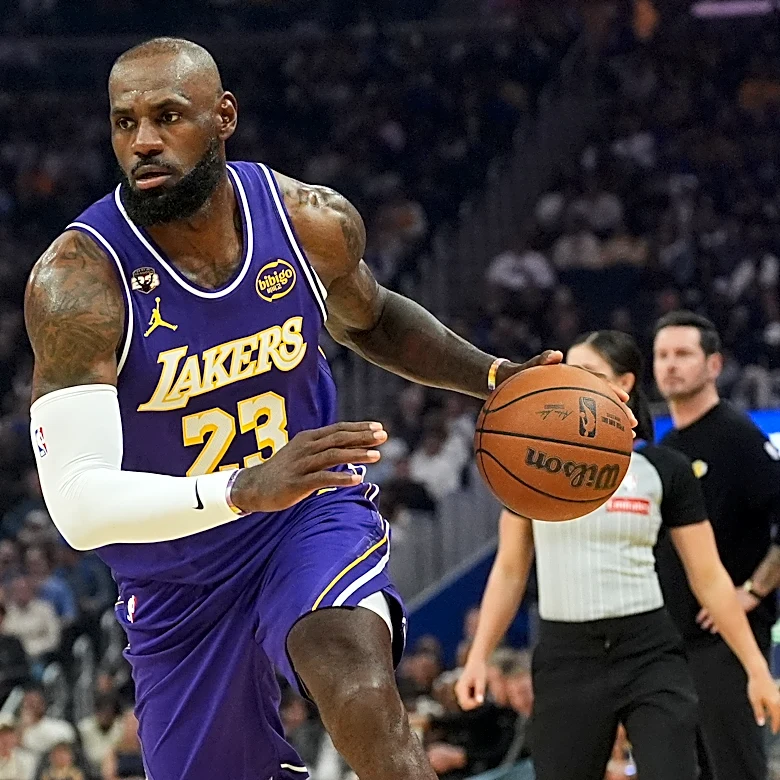 LeBron James has 26 points, 11 assists to lead Lakers past Warriors 119-103 as Stephen Curry sits