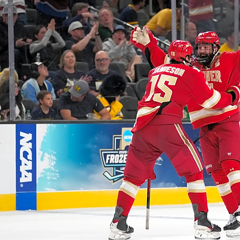 Kent Anderson’s 2-OT winner lifts Denver past Michigan 4-3 in Frozen Four thriller