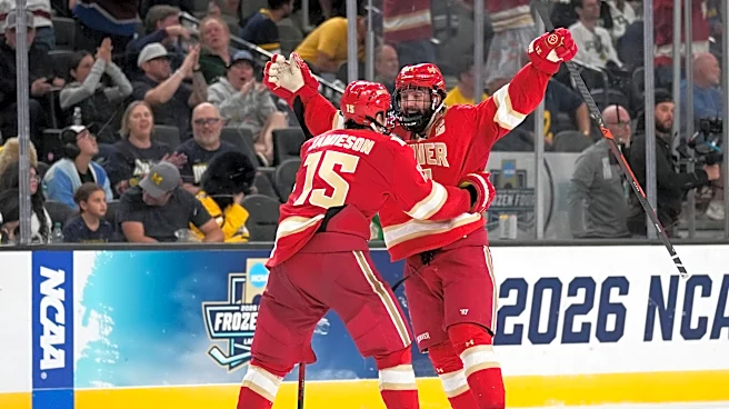 Kent Anderson’s 2-OT winner lifts Denver past Michigan 4-3 in Frozen Four thriller
