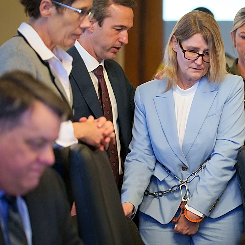 An Iowa woman pleads not guilty in the 2011 killing of real estate agent