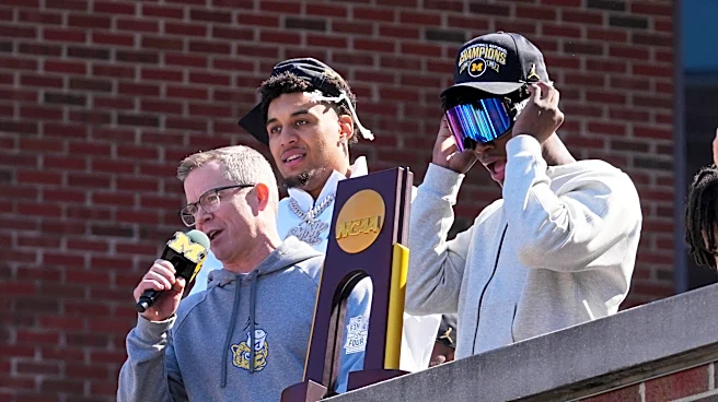 Michigan AD says Dusty May has agreed on deal to stay Wolverines coach 'for many years to come'