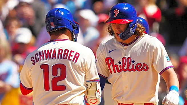 Schwarber, Harper homer to lead Phillies over Diamondbacks 4-3 to stop 3-game skid