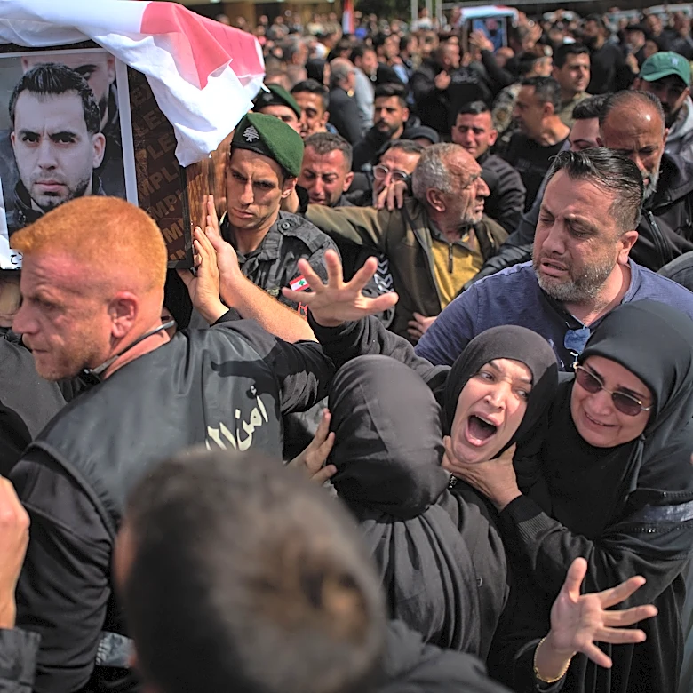 Lebanese bury 13 officers killed by Israel as grief and outrage surge ahead of talks in the US