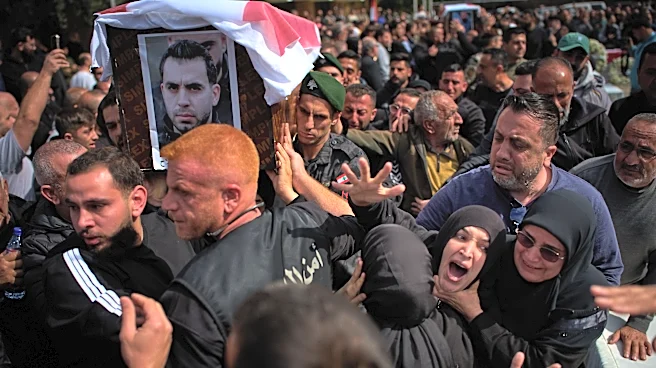 Lebanese bury 13 officers killed by Israel as grief and outrage surge ahead of talks in the US