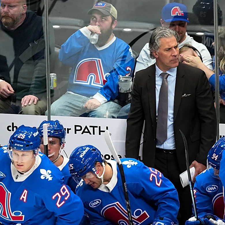 Avs coach Jared Bednar taken to hospital after being hit in his face with a puck