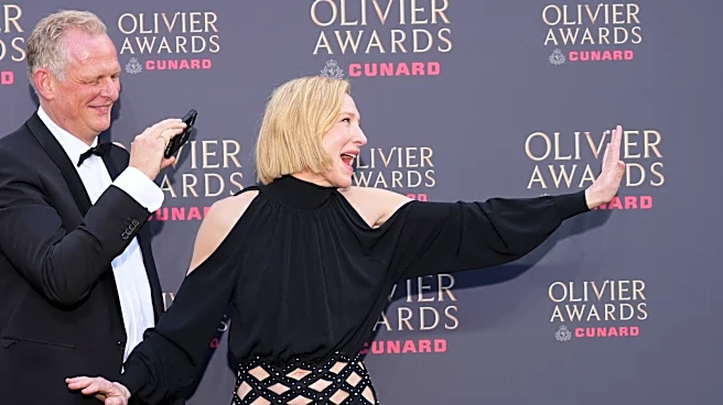 Rosamund Pike wins best actress and Paddington Bear gets best set design at London's Olivier Awards