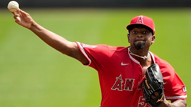 Soriano becomes MLB's first 4-game winner, lowers ERA to 0.33 as Angels beat Reds 9-6