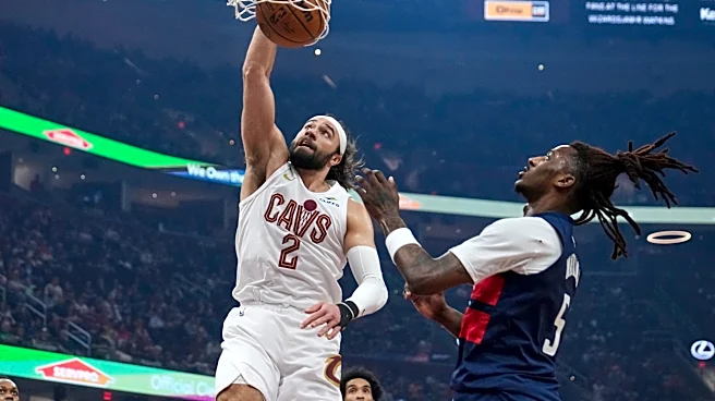 Tomlin scores career-high 26 as Cavaliers defeat Wizards 130-117 in regular-season finale