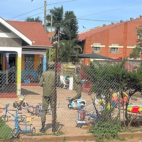 A trial in a tent draws crowds as Uganda debuts mobile court for man accused of killing 4 kids