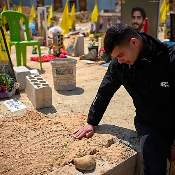 Hezbollah leader urges Lebanon's government to cancel Israel talks as battle rages in strategic town