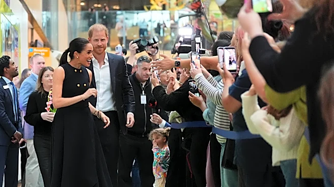 Prince Harry and Meghan arrive in Australia for a low-key, privately funded visit