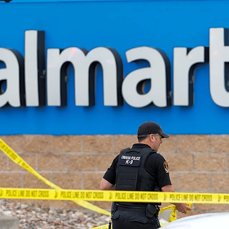 Omaha, Nebraska, police fatally shoot a woman who grabs a child and slashes him with a knife