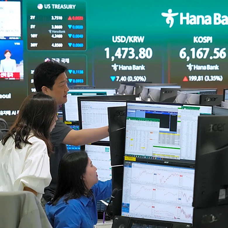 Asian shares mostly rise after Wall Street rallies on lower oil prices