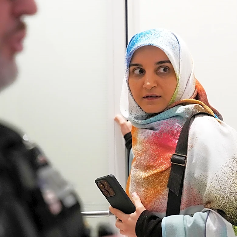 An Iranian national convicted in France returns to Iran after release of 2 French citizens