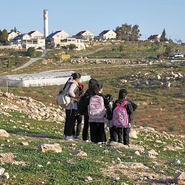 Israeli settlers block Palestinian kids' path to school with tear gas and barbed wire