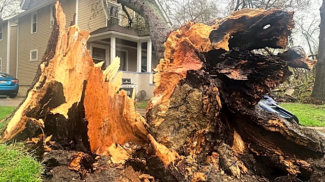 Floodwaters inundate Wisconsin streets, trapping drivers, as Midwest rebuilds after powerful storms