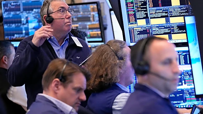 Wall Street holds at its record high even as oil prices climb