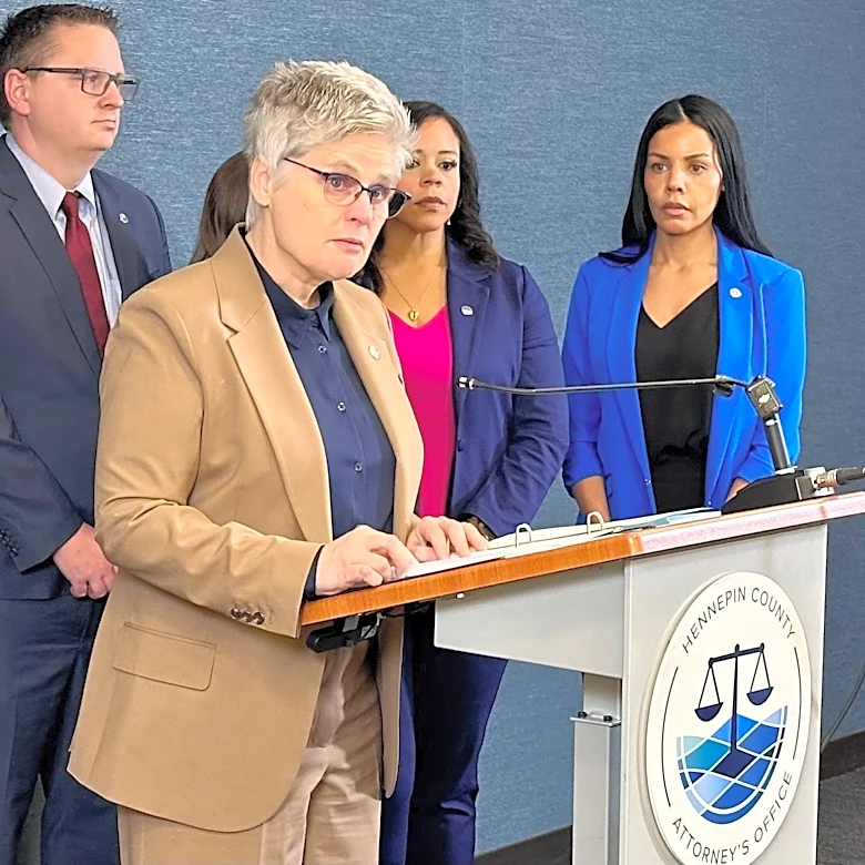 County prosecutor charges ICE agent with assault for pointing gun at people on Minneapolis highway